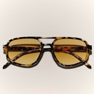marble frame aviator sunglasses with brown tinted lens